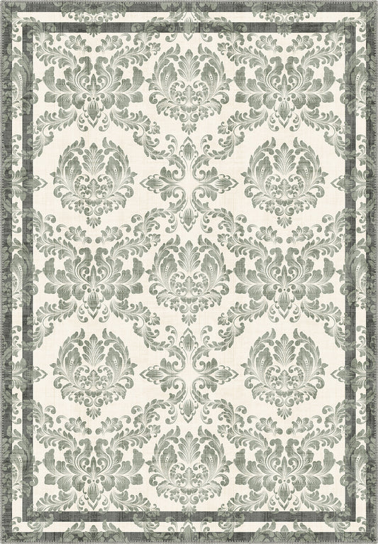 Green floral rug with damask pattern.