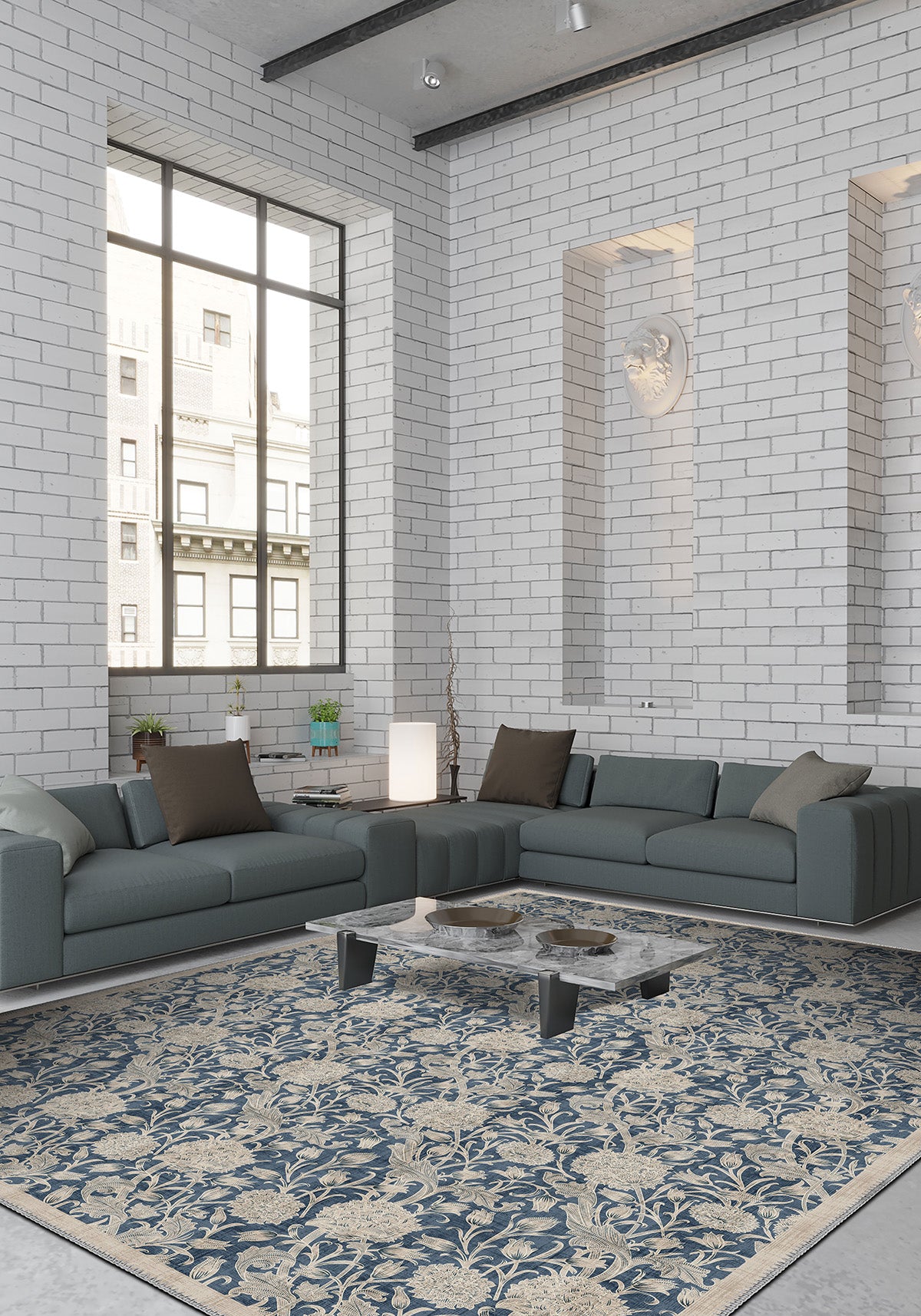 Modern living room with gray sectional sofa, coffee table, and decorative rug on white brick walls.