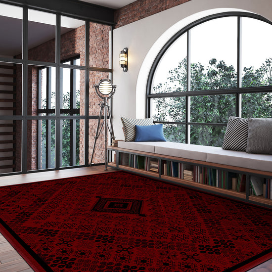 Red patterned rug for living room.