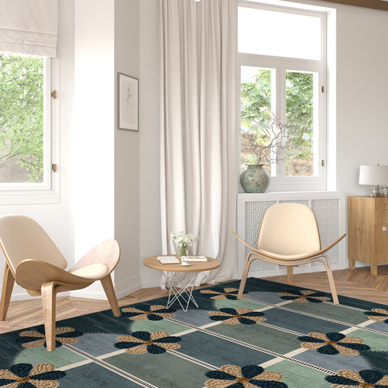 Living room with a patterned rug, chairs, and a window.