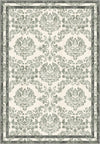 Green floral rug with damask pattern.