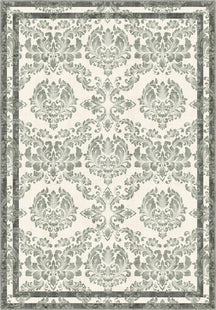 Green floral rug with damask pattern.