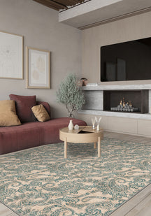 Cream teal paisley rug.