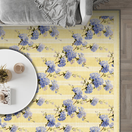 Yellow and lavender floral rug for living room.