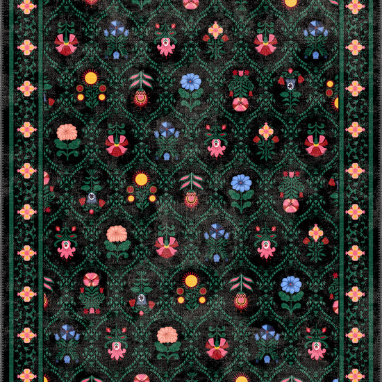 Kilim rug with floral patterns on a dark green and black background