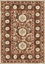Bohemian terracotta rug with suzani motifs.
